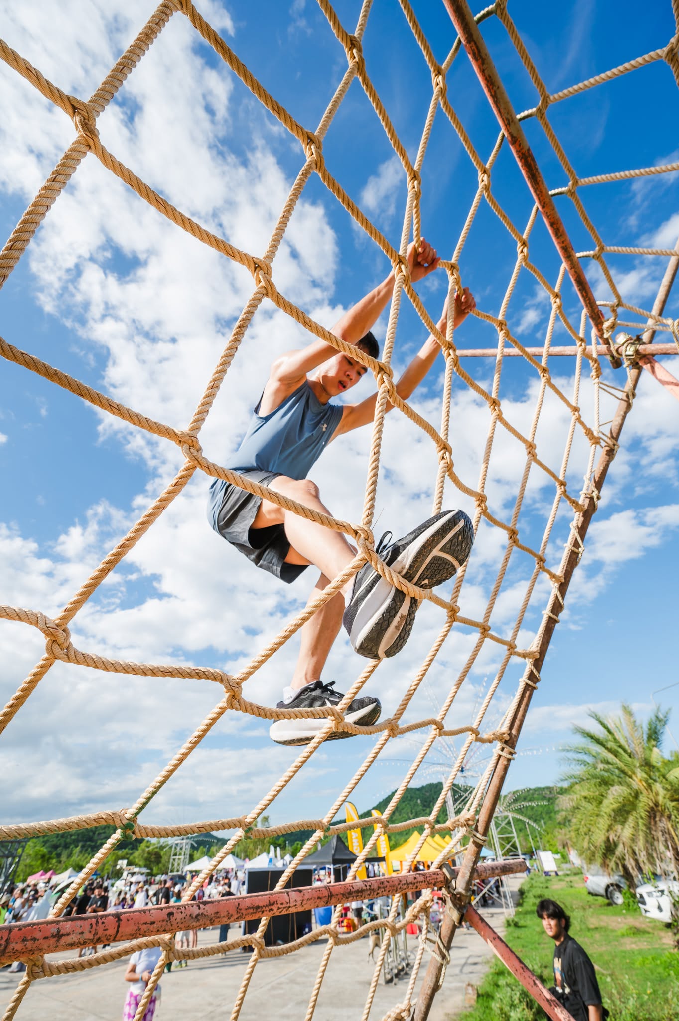 Young participants taking on an outdoor obstacle challenge